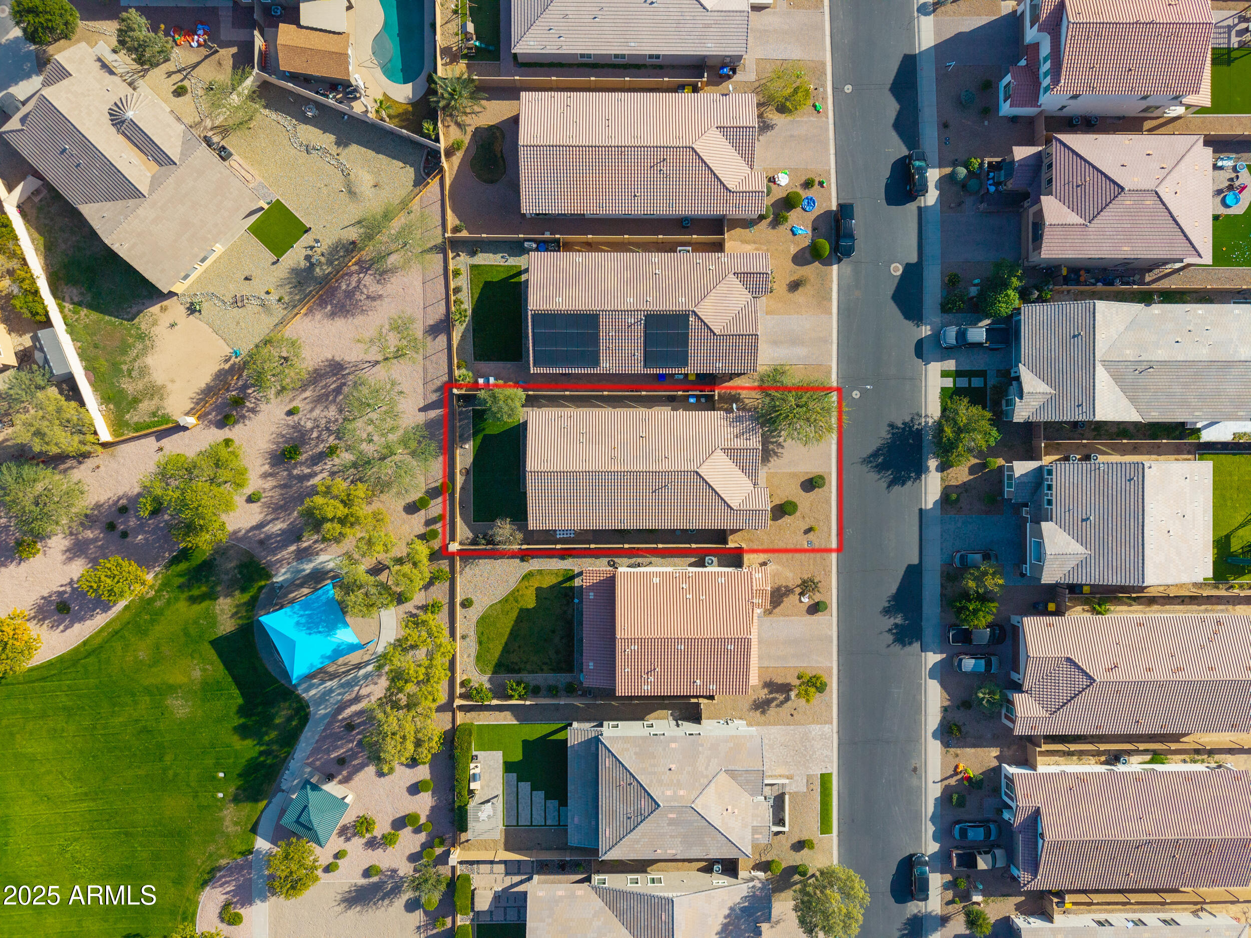 44202 West Palo Olmo Road Maricopa, AZ 85138 - Photo 30 of 32 an aerial view of residential houses with outdoor space