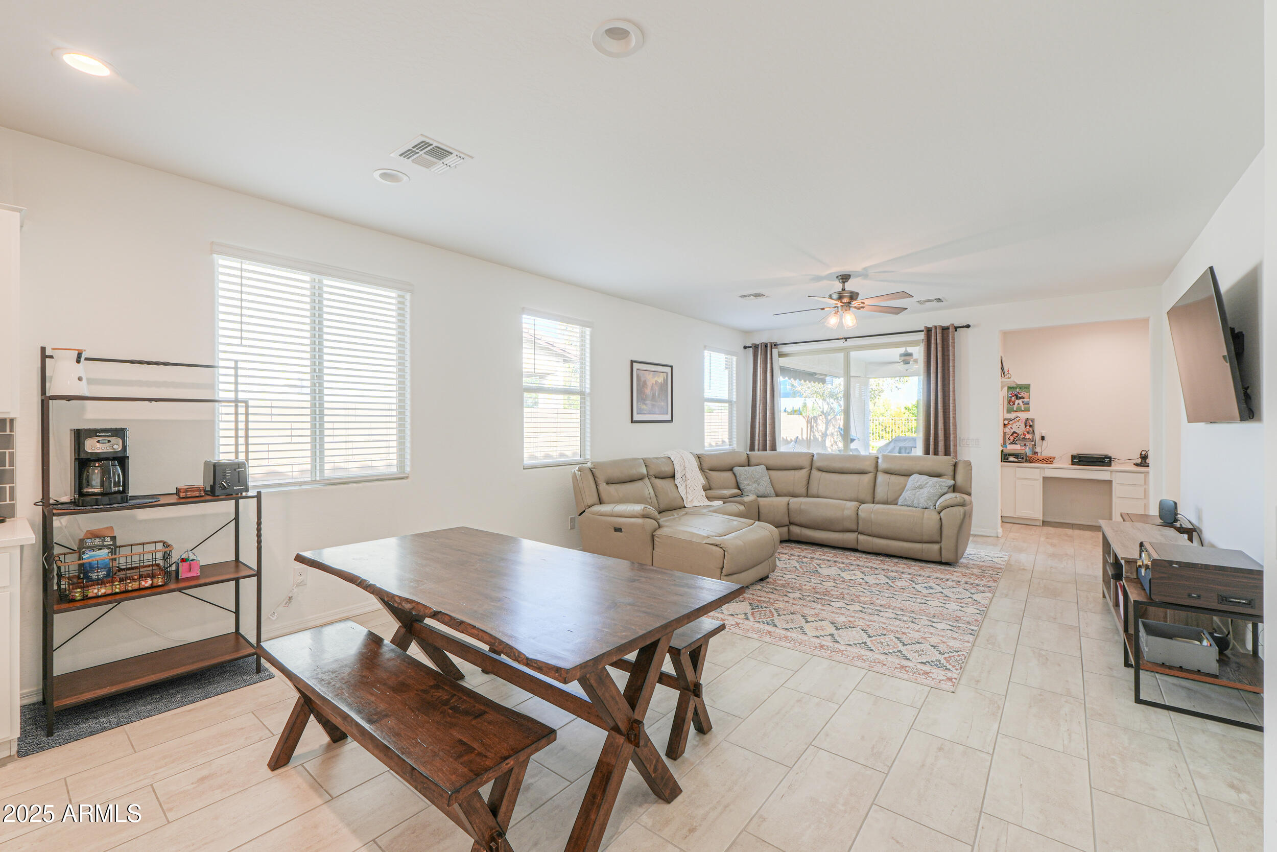 44202 West Palo Olmo Road Maricopa, AZ 85138 - Photo 7 of 32 a dining room with furniture and wooden floor