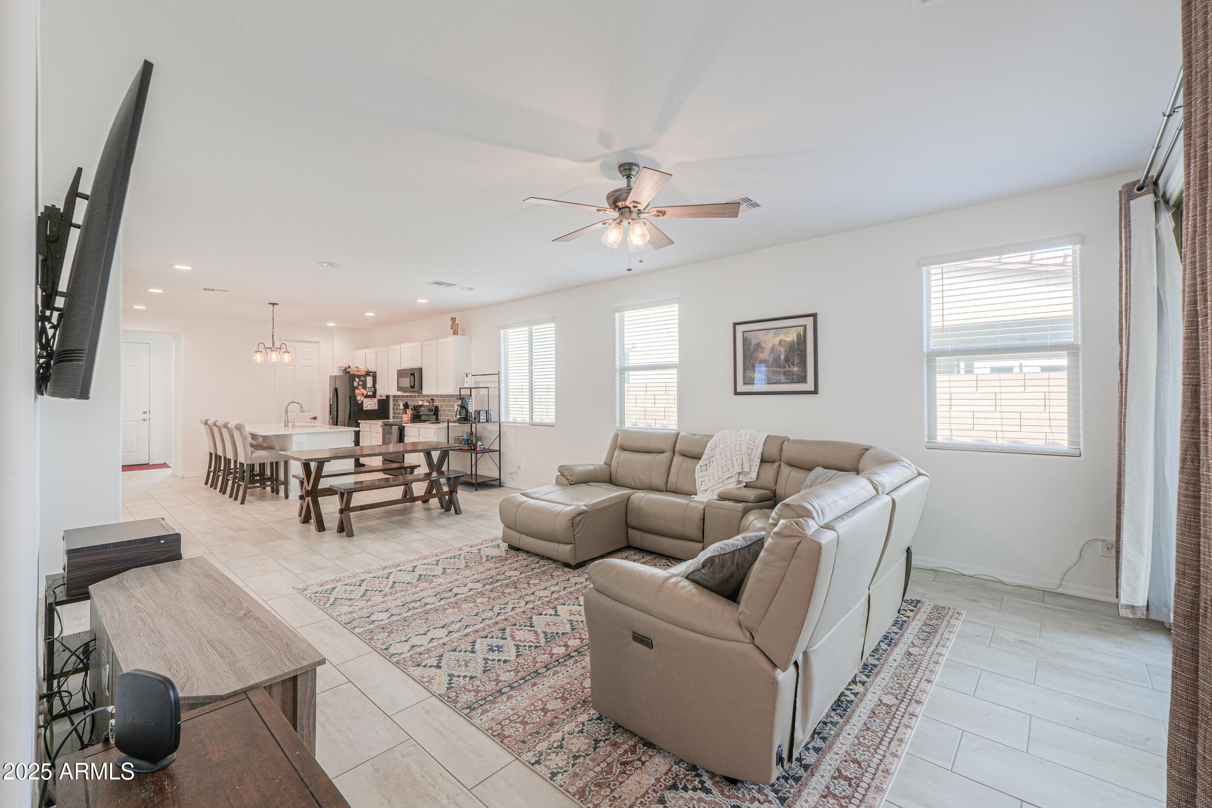 44202 West Palo Olmo Road Maricopa, AZ 85138 - Photo 8 of 32 a living room with furniture and a window