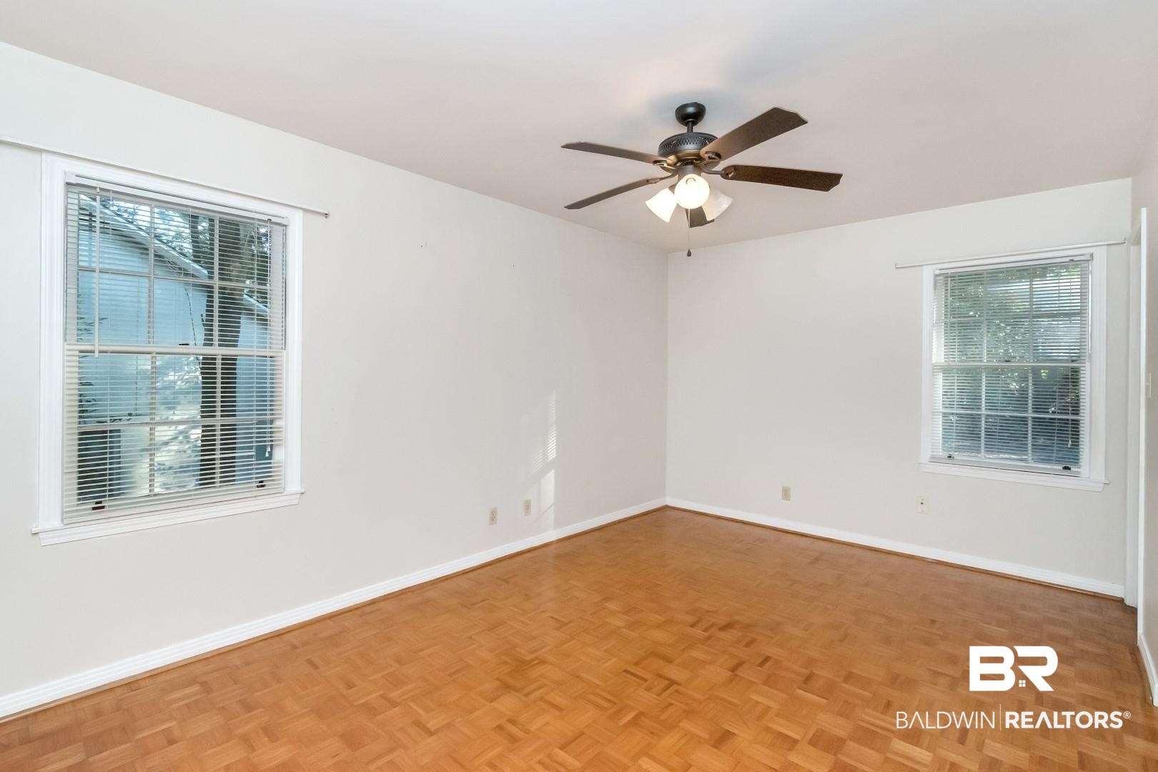 5517 Vanderbilt Drive Mobile, AL 36608 - Photo 24 of 33 Unfurnished room featuring ceiling fan and light parquet flooring