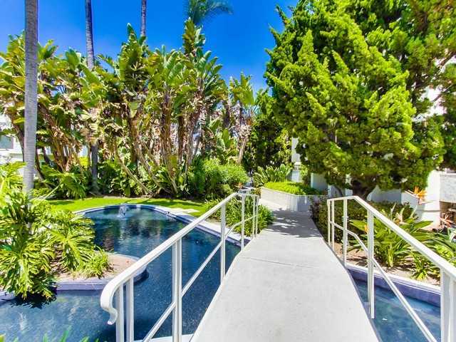 2352 Torrey Pines Road, Unit 7 La Jolla, CA 92037 - Photo 22 of 25 Walking Bridge over Pond on condo complex grounds