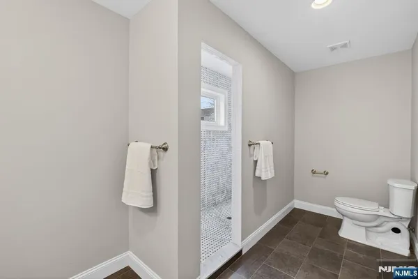 a bedroom with a bed and furniture