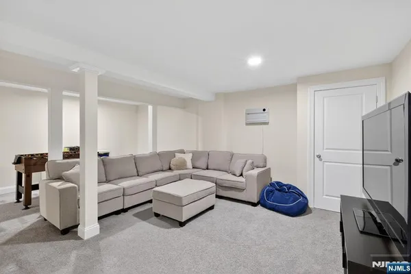 a living room with furniture and a table