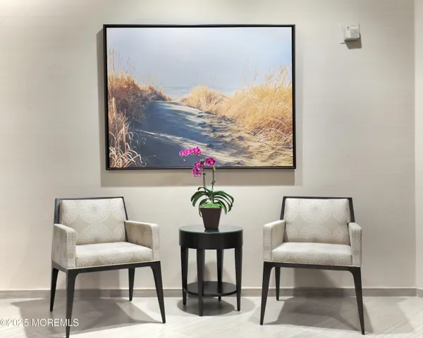 a view of a swimming pool and lounge chairs