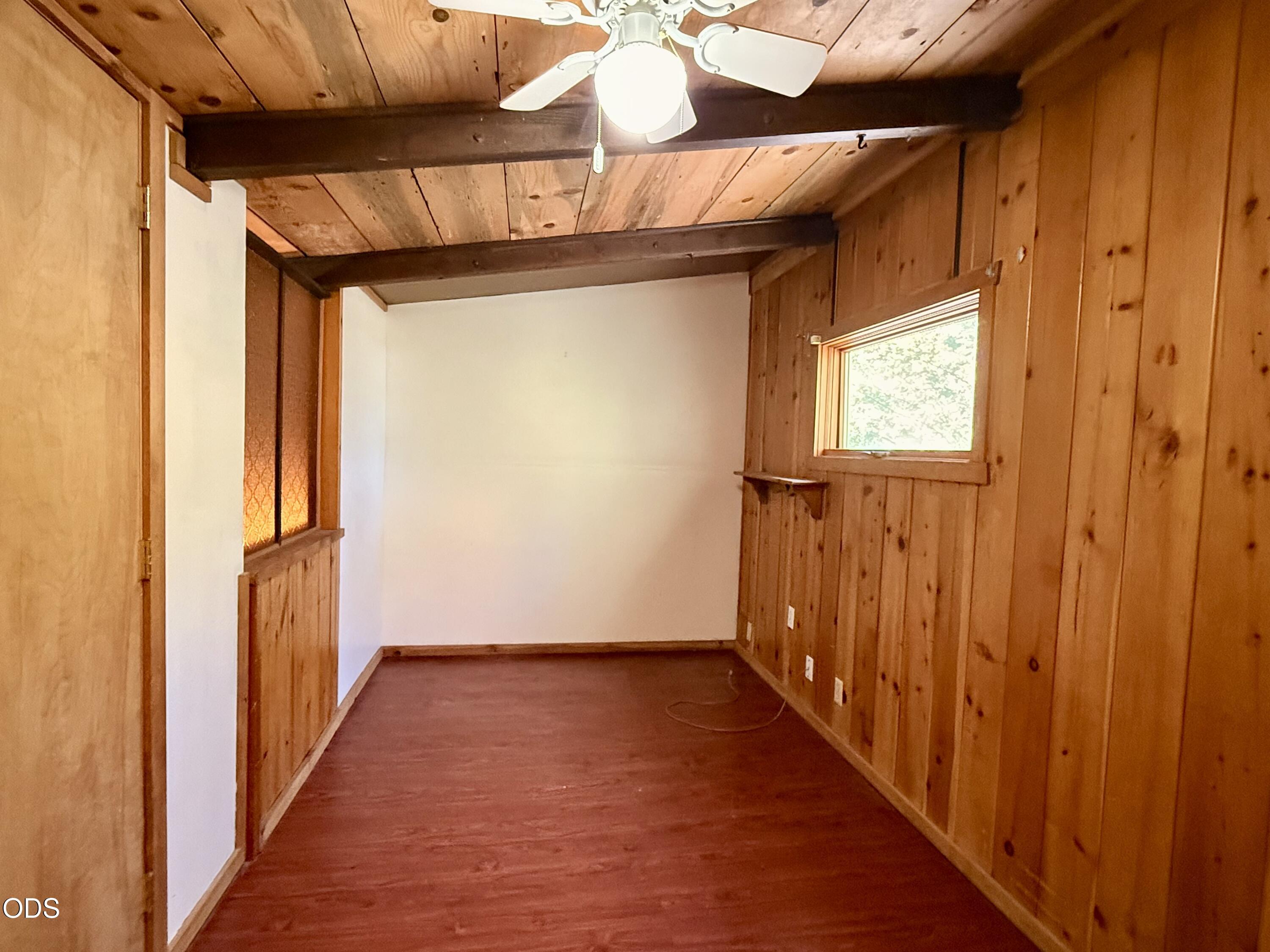 16025 Strawn Road La Pine, OR 97739 - Photo 34 of 95 a view of a hallway with wooden floor and staircase