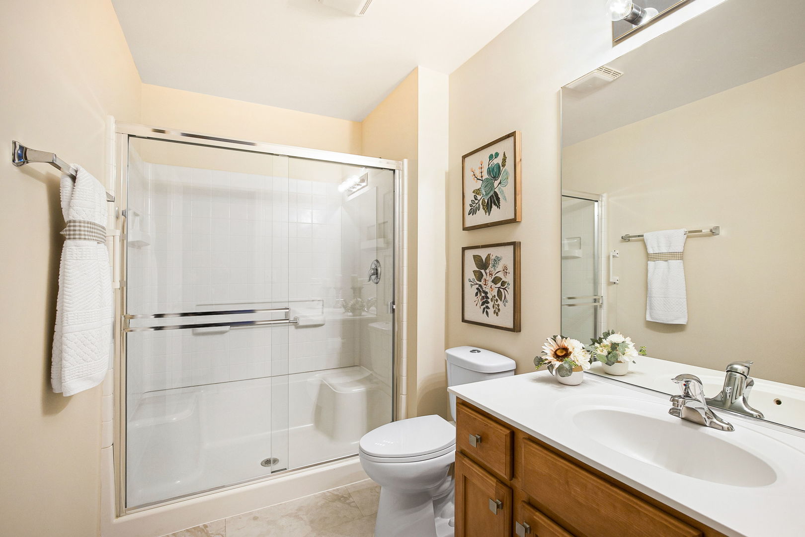 626 South Curran Road Round Lake, IL 60073 - Photo 17 of 25 a bathroom with a sink toilet and shower