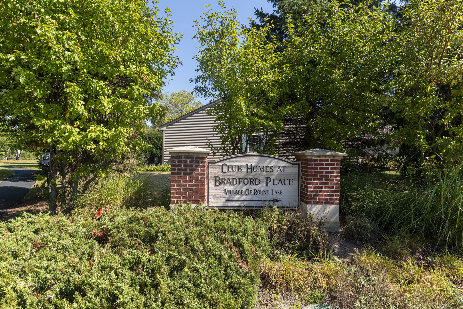 626 South Curran Road Round Lake, IL 60073 - Photo 25 of 25 a sign board with a house and garden