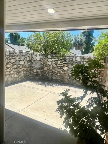 a view of a garden from a yard