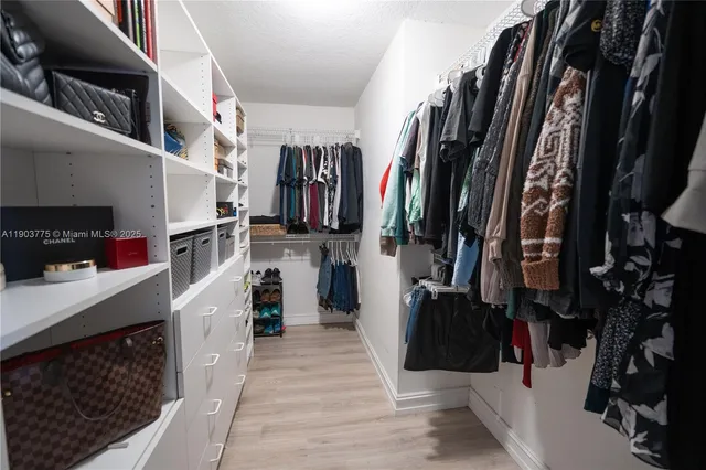 a bathroom with a double vanity sink mirror and double