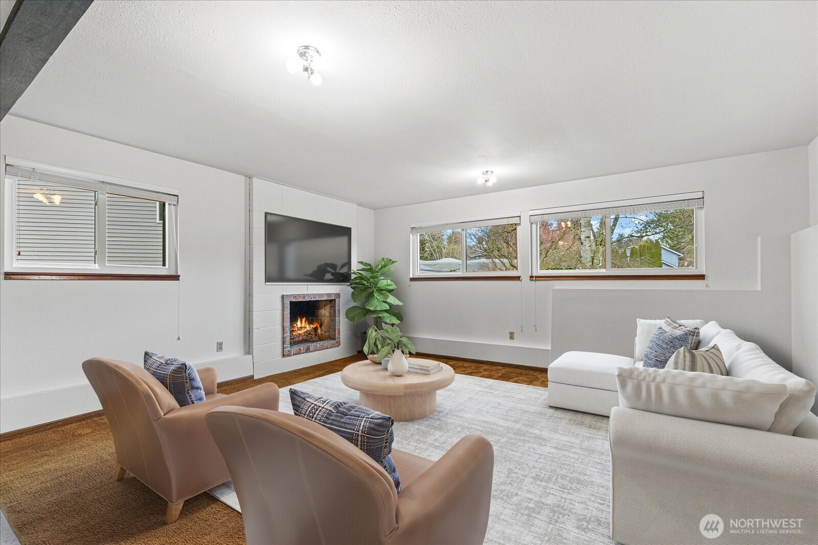 12121 Northeast 161st Street Bothell, WA 98011 - Photo 13 of 22 a living room with furniture a fireplace and a window
