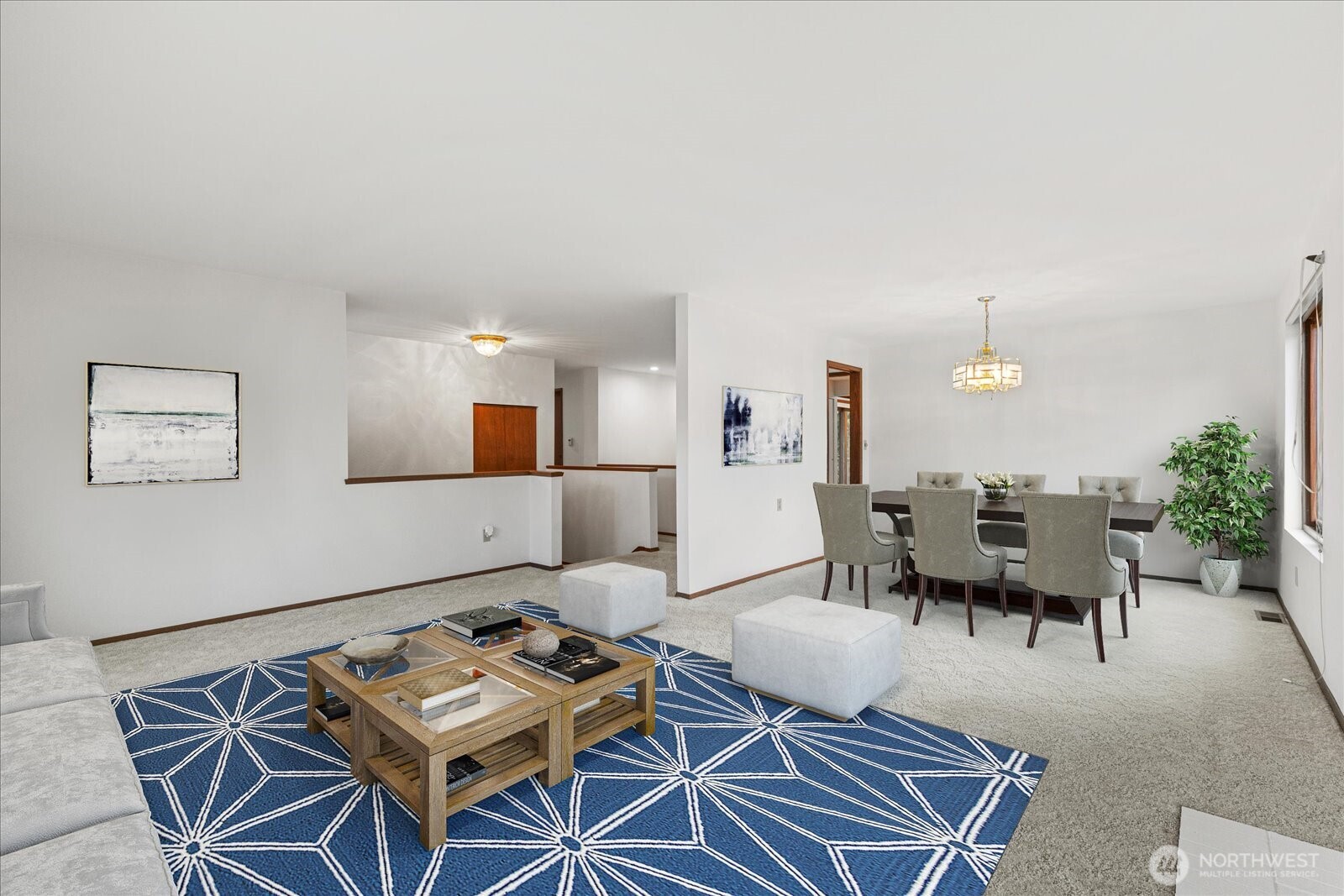 12121 Northeast 161st Street Bothell, WA 98011 - Photo 3 of 22 a living room with furniture a rug and a table