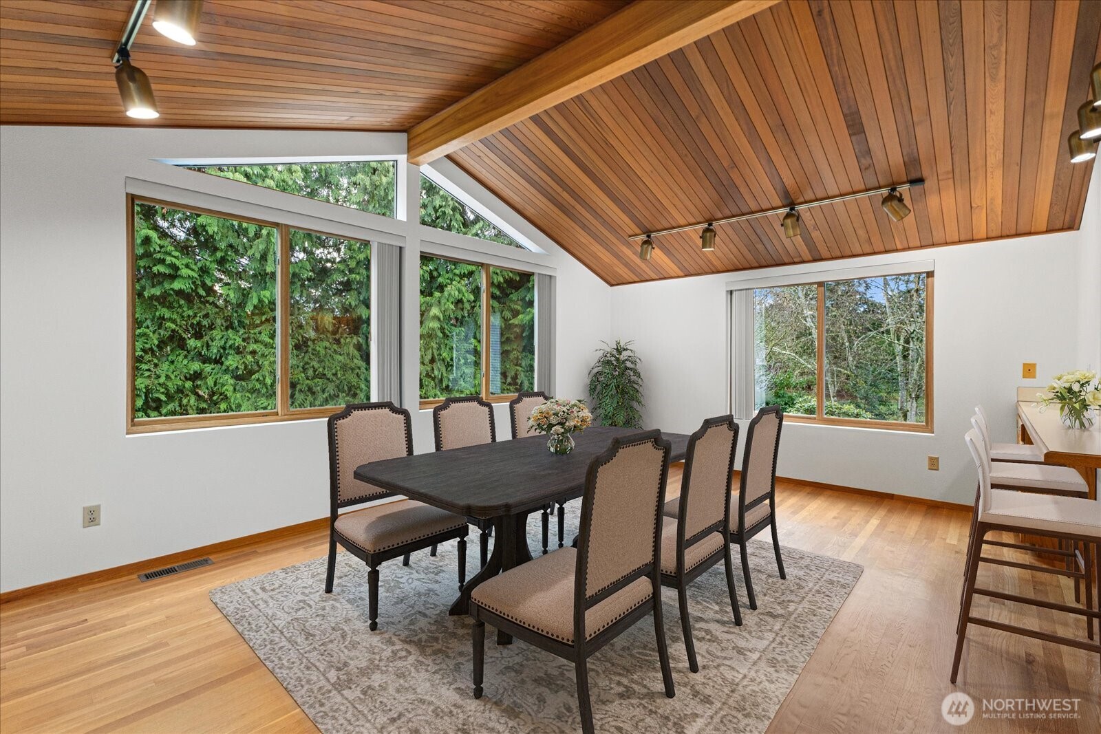 12121 Northeast 161st Street Bothell, WA 98011 - Photo 5 of 22 a dining room with furniture a rug and wooden floor