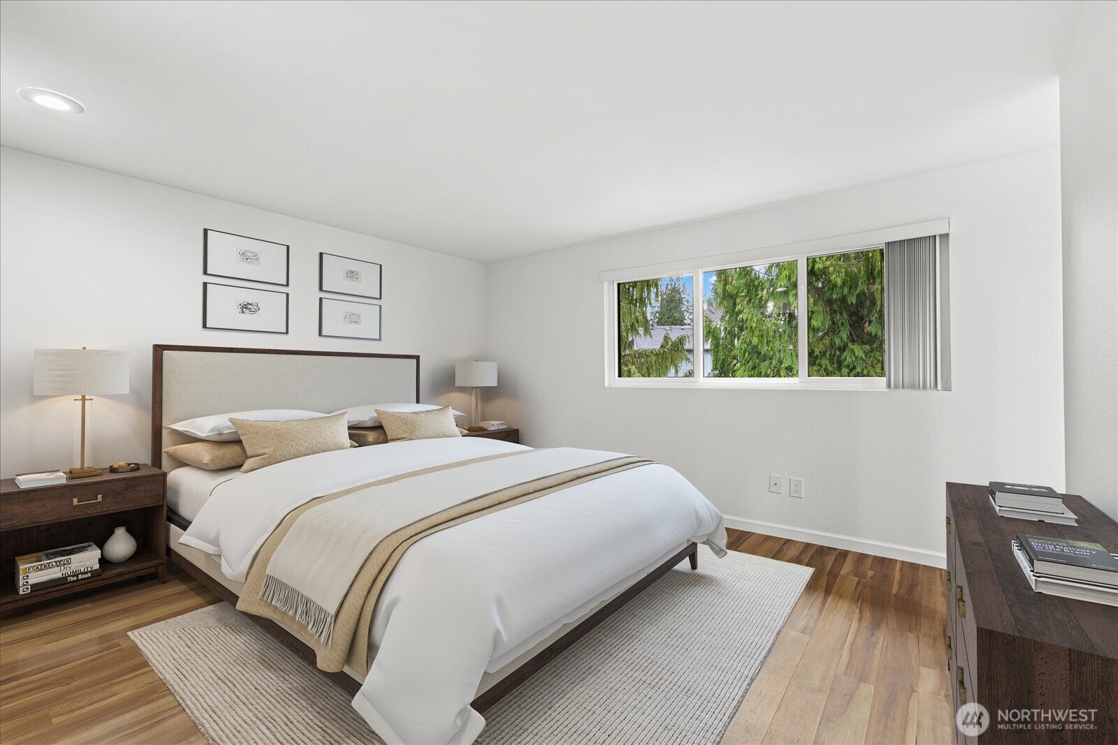 12121 Northeast 161st Street Bothell, WA 98011 - Photo 8 of 22 a bedroom with a bed and wooden floor