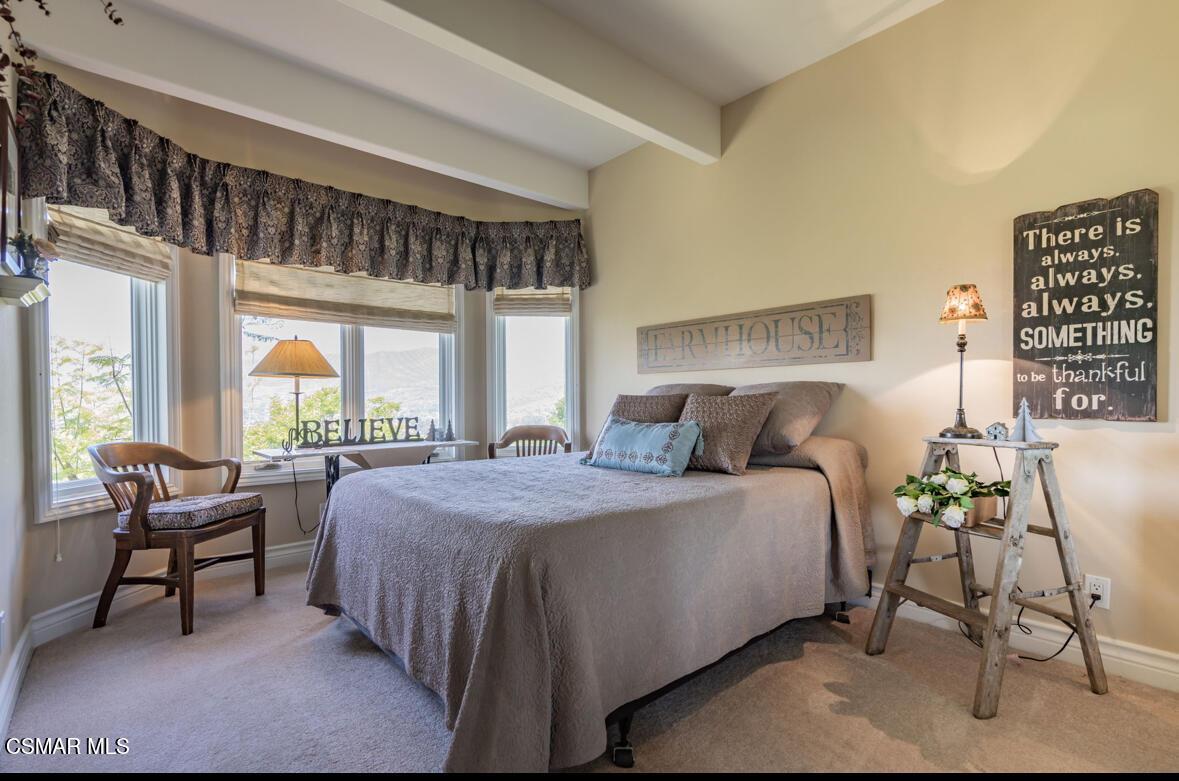 1029 Alta Vista Road Simi Valley, CA 93063 - Photo 14 of 20 a bedroom with a bed and a large window