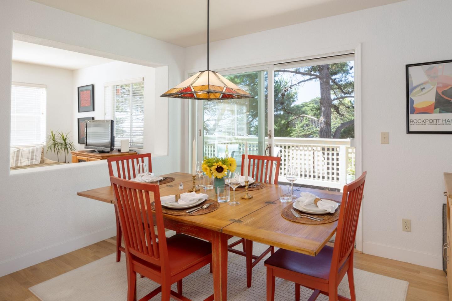 40 Patrick Way Half Moon Bay, CA 94019 - Photo 14 of 39 a dining room with furniture a chandelier and wooden floor