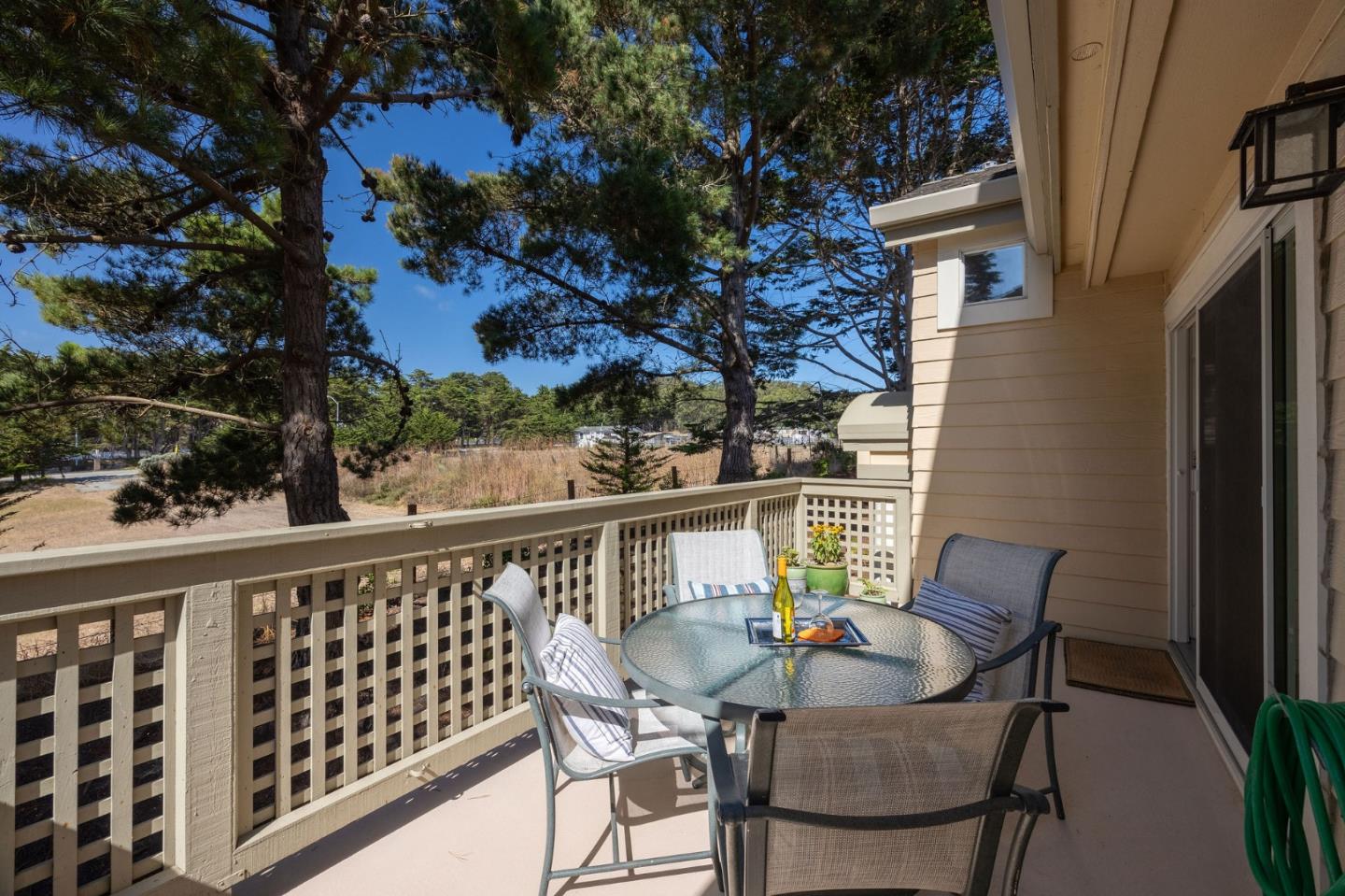 40 Patrick Way Half Moon Bay, CA 94019 - Photo 17 of 39 a view of a chair and table in the balcony