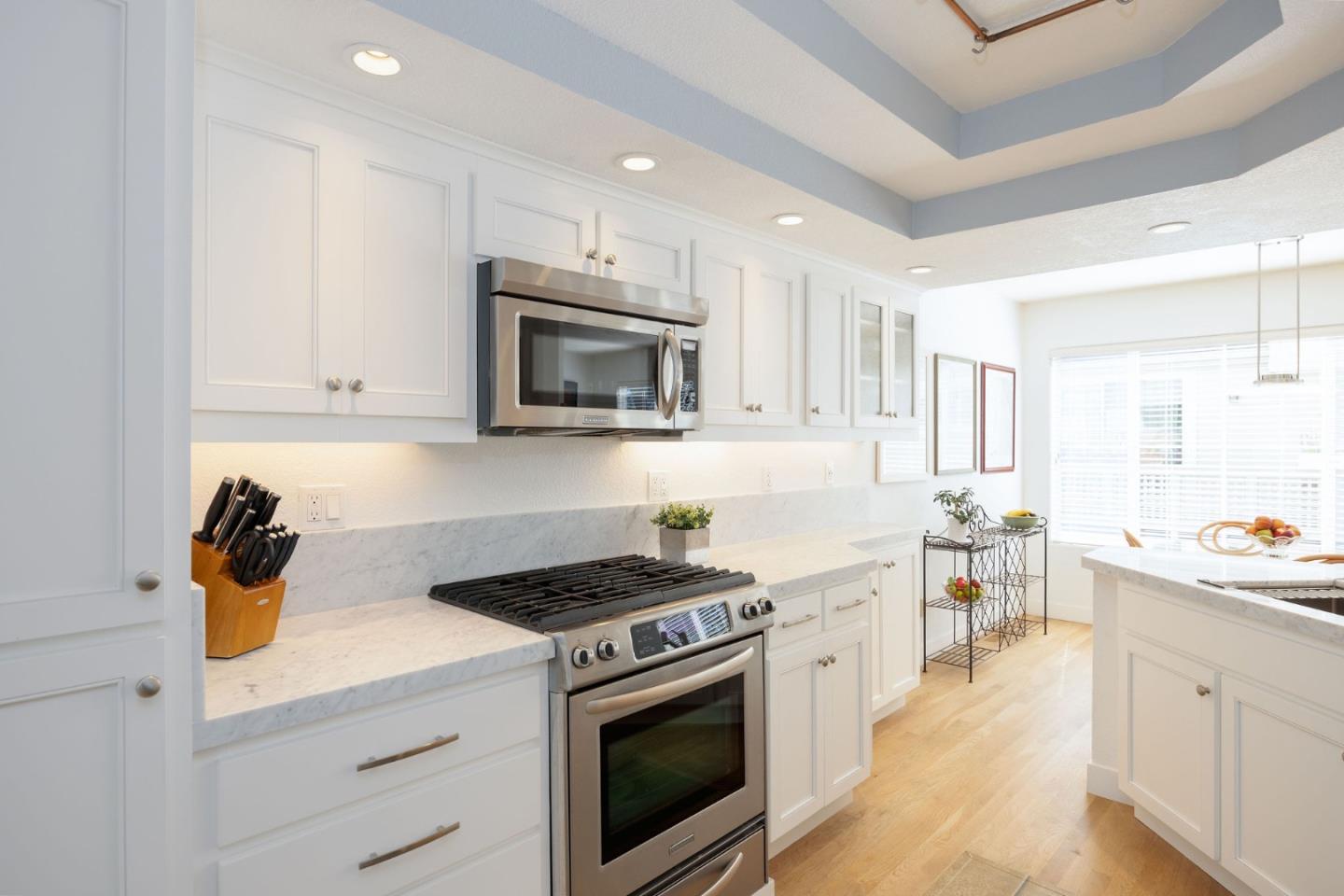 40 Patrick Way Half Moon Bay, CA 94019 - Photo 21 of 39 a kitchen with a stove a sink and a microwave