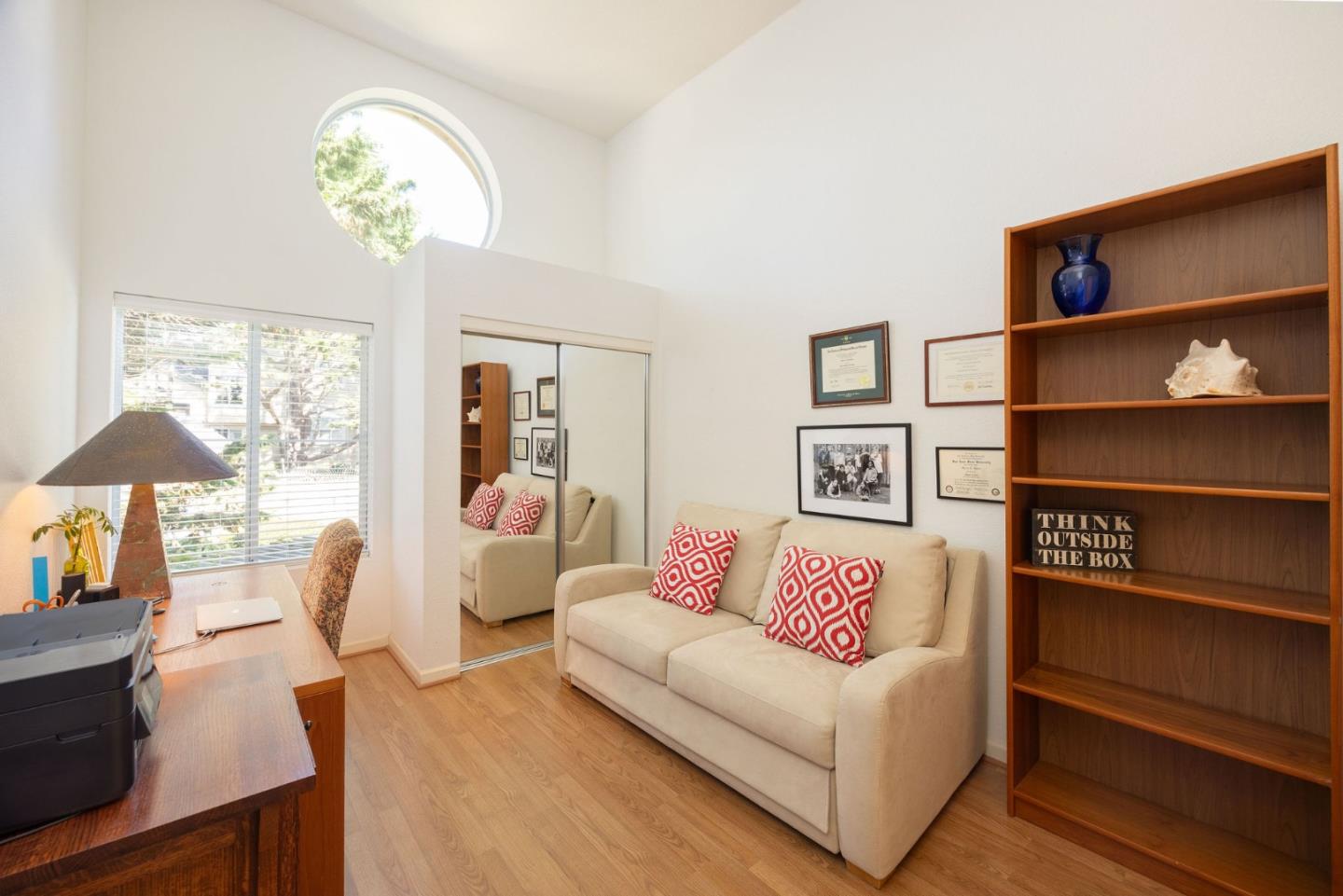 40 Patrick Way Half Moon Bay, CA 94019 - Photo 25 of 39 a living room with furniture and a chandelier