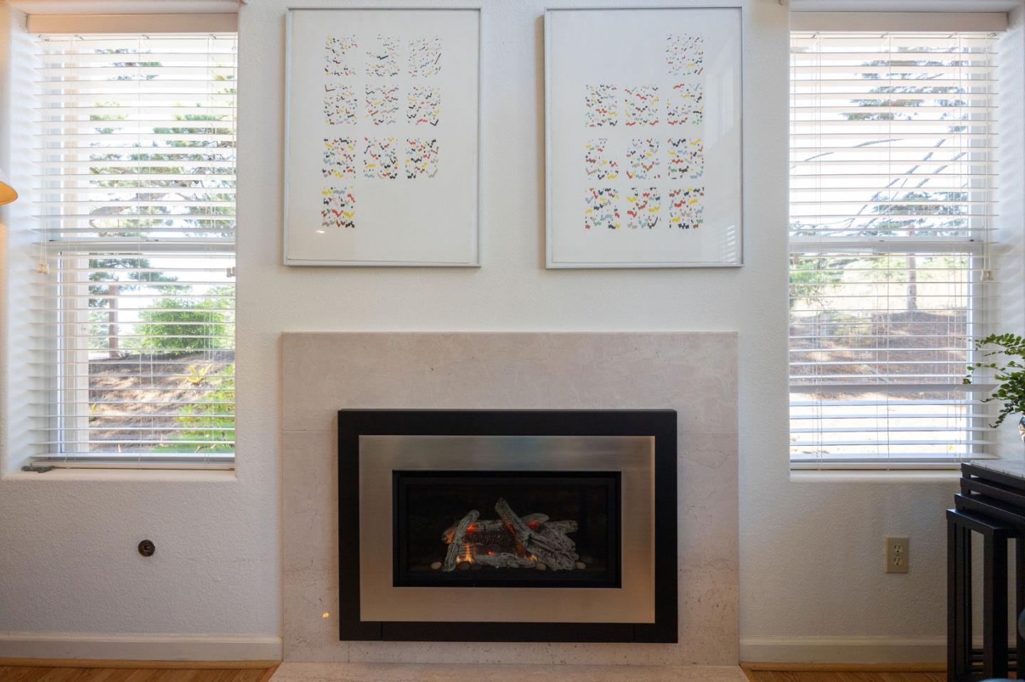 40 Patrick Way Half Moon Bay, CA 94019 - Photo 7 of 39 a living room with a large window and a fireplace