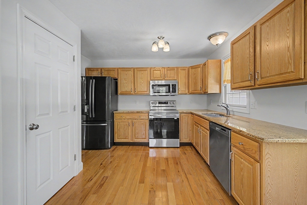 792 Ryan Road Northampton, MA 01062 - Photo 9 of 29 a kitchen with stainless steel appliances a refrigerator sink and cabinets