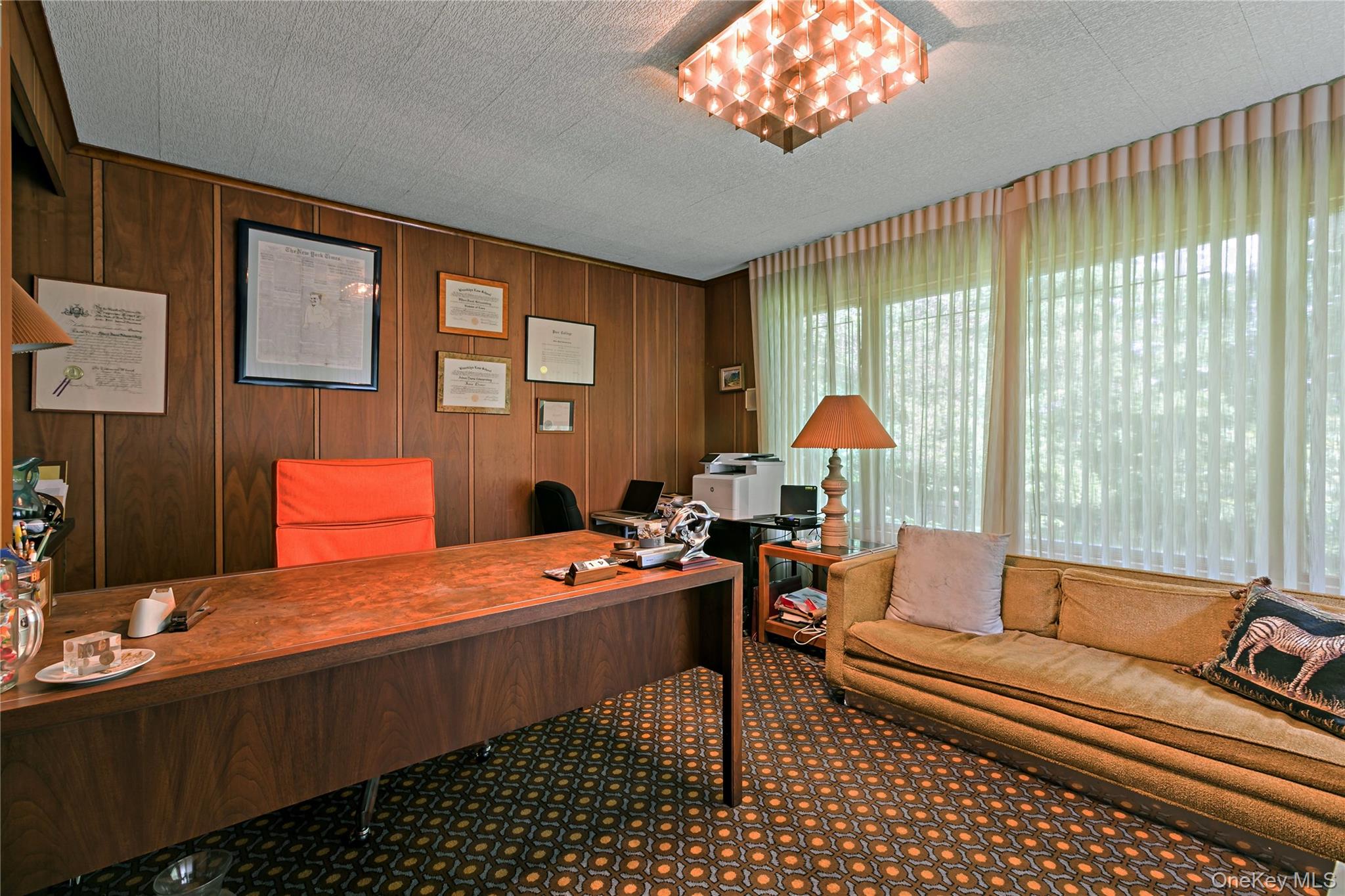 16 Meadow Road Scarsdale, NY 10583 - Photo 13 of 47 a bedroom with furniture and a lamp