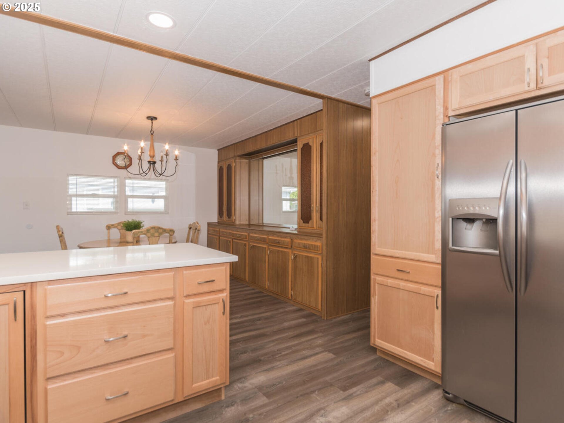 21016 Southeast Stark Street, Unit 69 Gresham, OR 97030 - Photo 25 of 43 a kitchen with a refrigerator and a sink