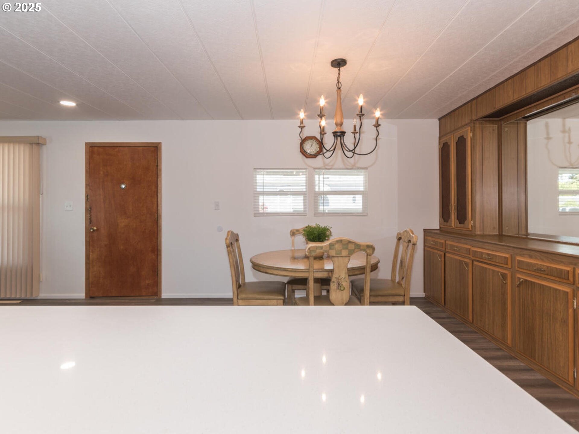 21016 Southeast Stark Street, Unit 69 Gresham, OR 97030 - Photo 26 of 43 a view of a dining room with furniture and window