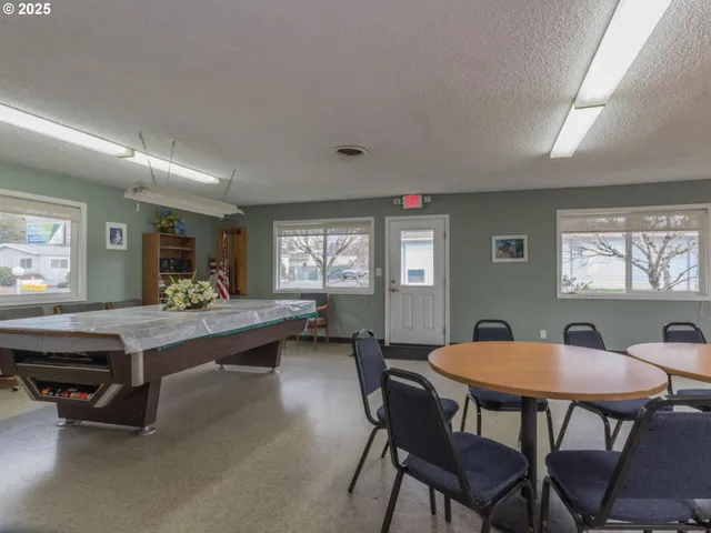 a view of a backyard of the house