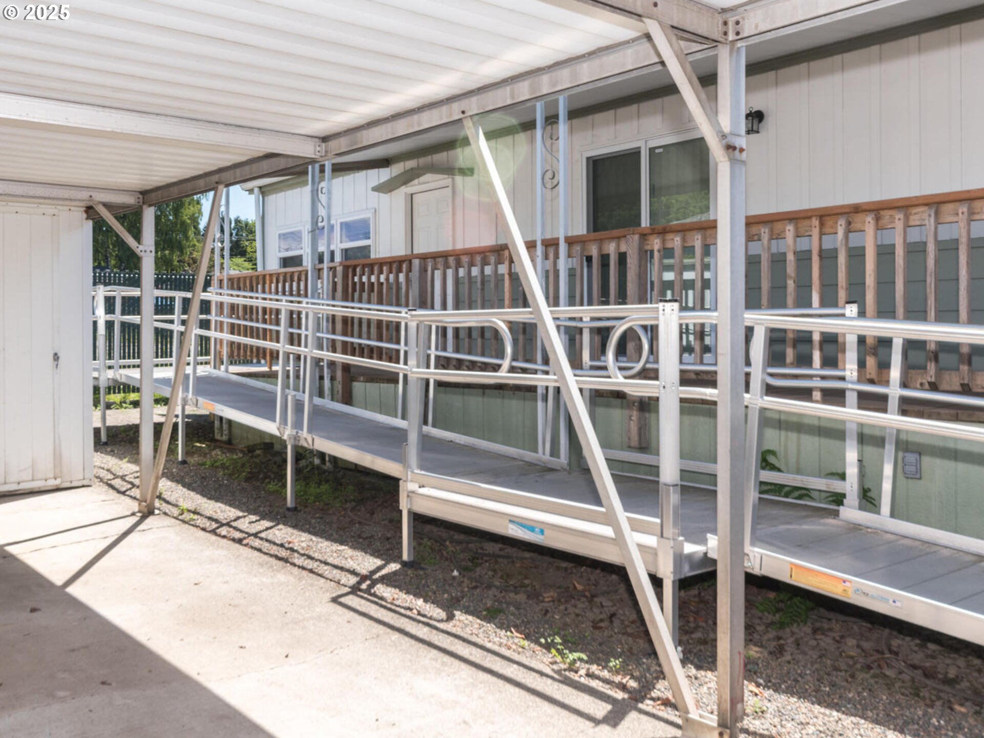 21016 Southeast Stark Street, Unit 69 Gresham, OR 97030 - Photo 6 of 43 a front view of a house with a large window