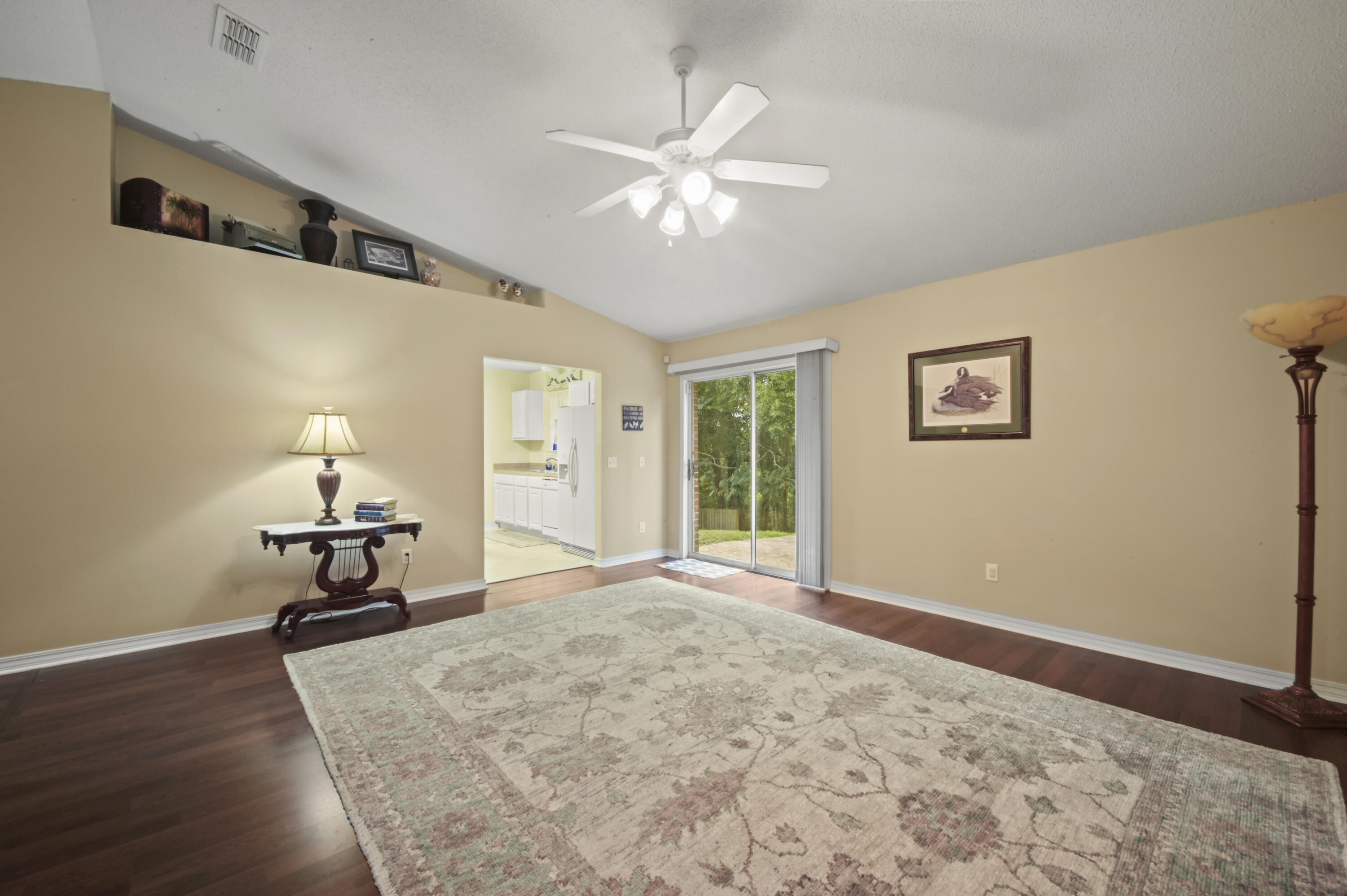 334 Egan Drive Crestview, FL 32536 - Photo 11 of 33 a bedroom with furniture window and a ceiling fan