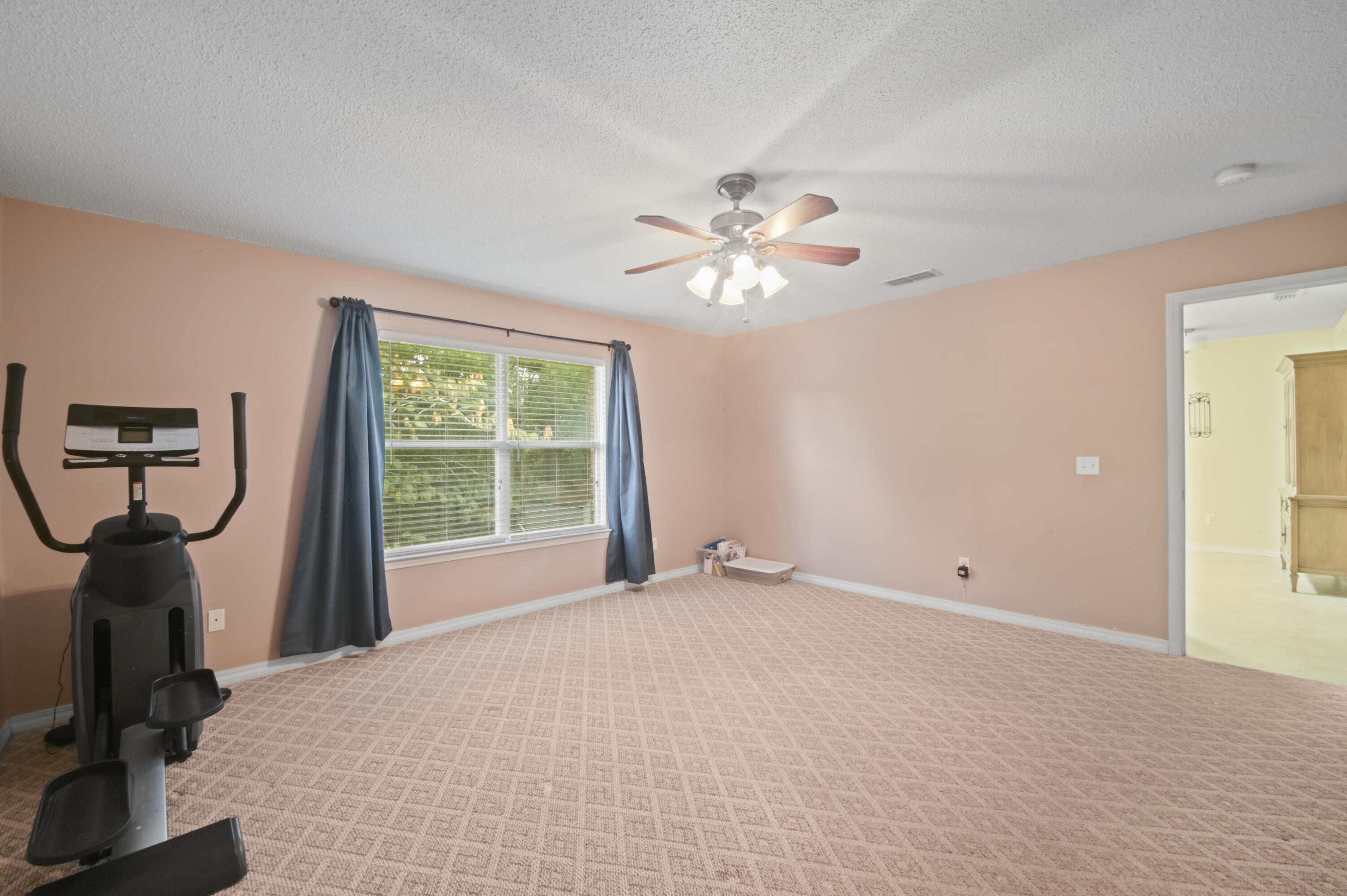 334 Egan Drive Crestview, FL 32536 - Photo 17 of 33 a view of an empty room with a window