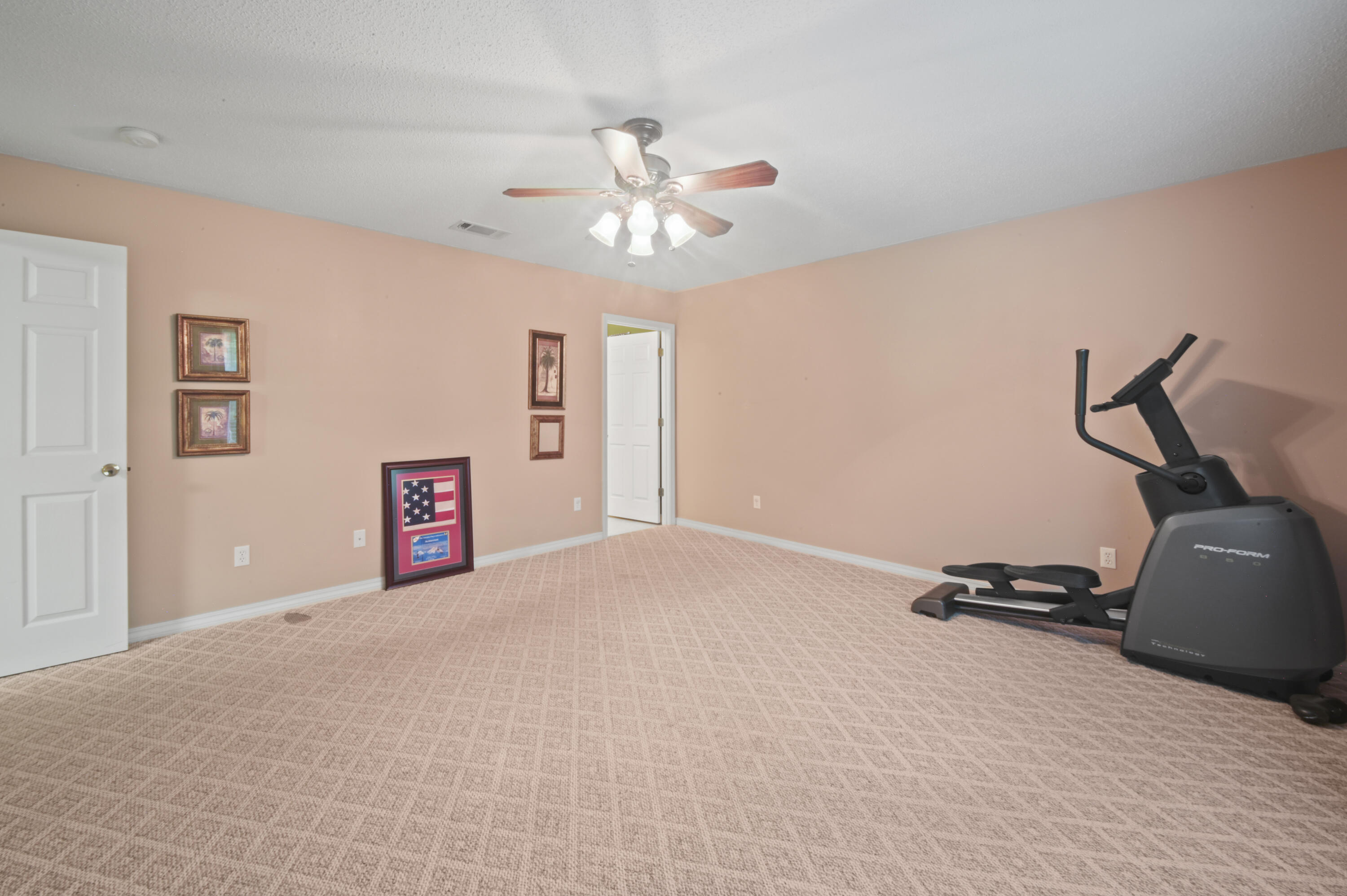 334 Egan Drive Crestview, FL 32536 - Photo 19 of 33 a view of workspace with gym equipment