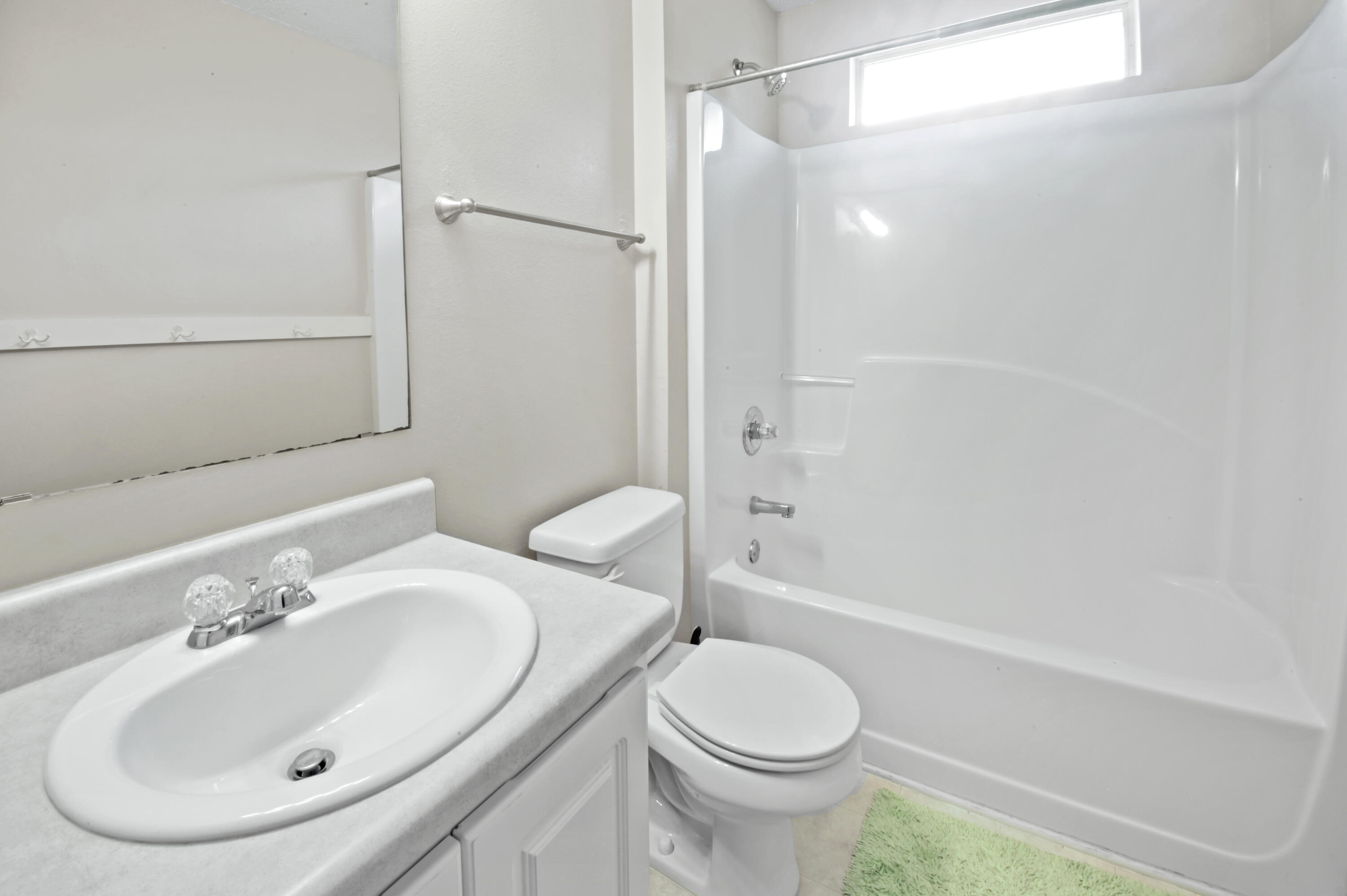 334 Egan Drive Crestview, FL 32536 - Photo 28 of 33 a bathroom with a sink toilet and shower