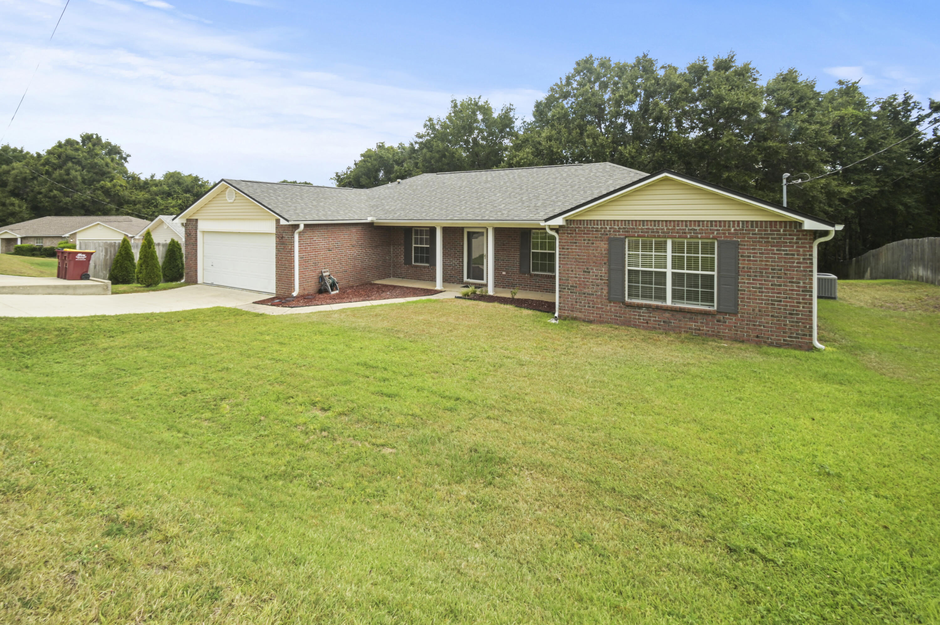 334 Egan Drive Crestview, FL 32536 - Photo 3 of 33 a front view of a house with yard and trees