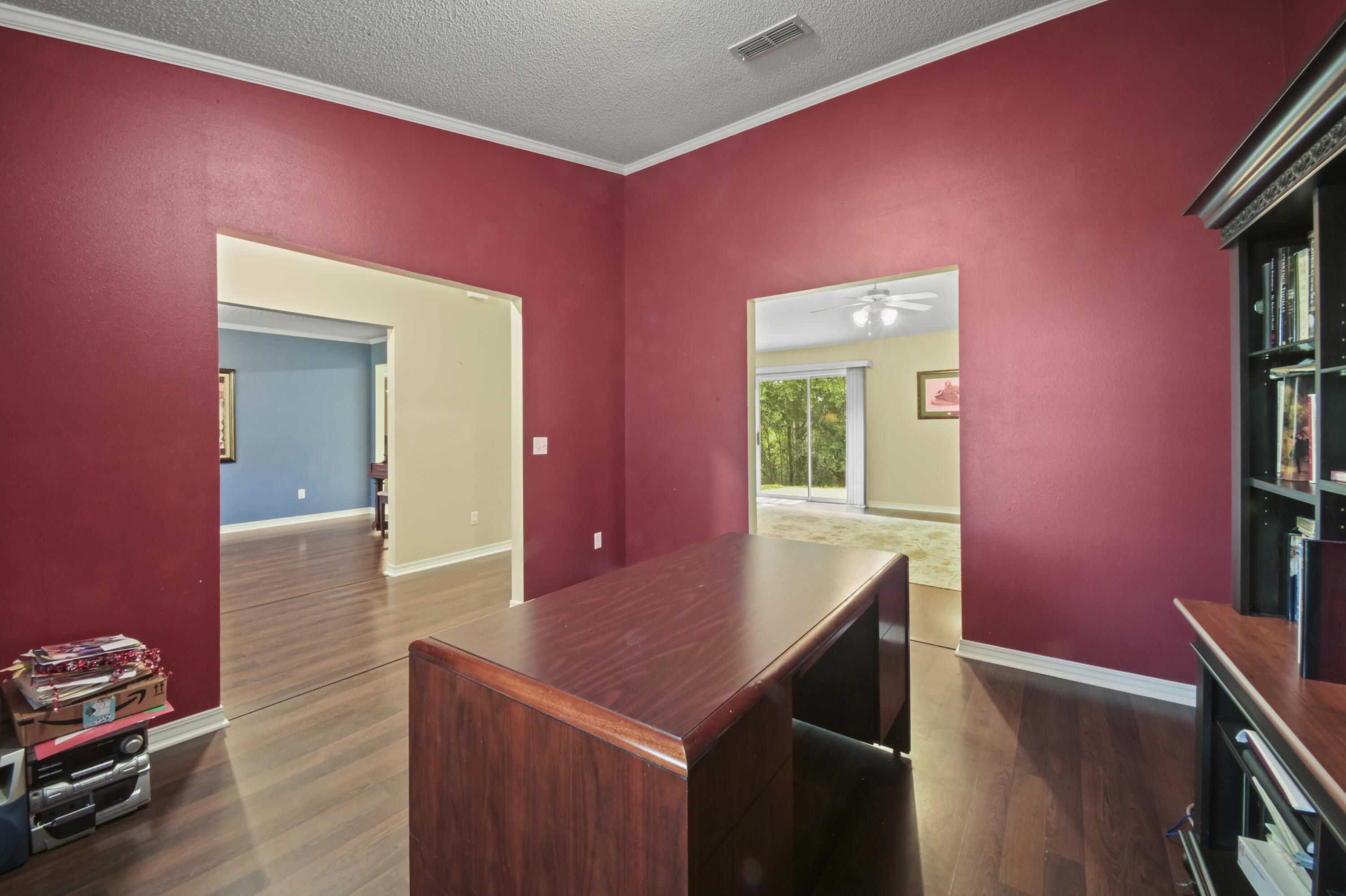 334 Egan Drive Crestview, FL 32536 - Photo 5 of 33 a room with furniture and wooden floor