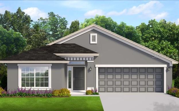 2194 Northwest 23rd Loop Ocala, FL 34475 - Photo 1 of 18 a front view of a house with a yard