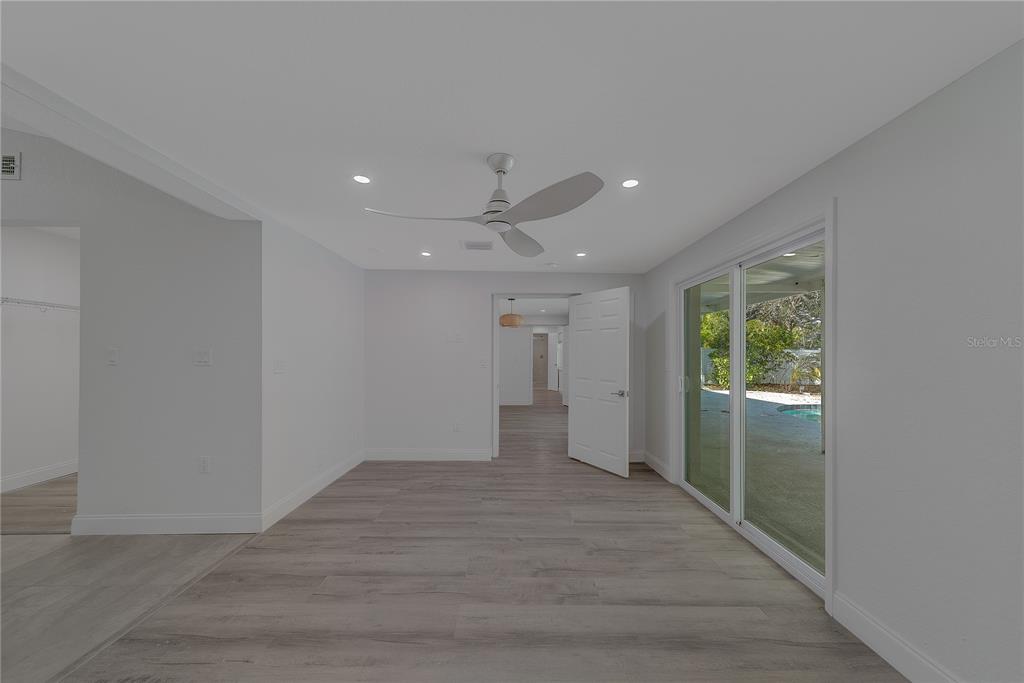 1152 Jackmar Road Dunedin, FL 34698 - Photo 28 of 60 a view of an empty room with a window