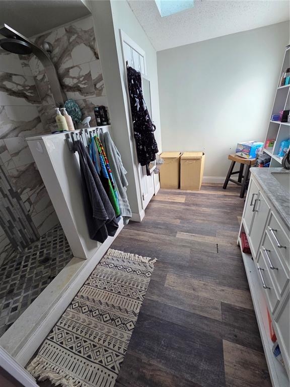 3935 Rambler Avenue St. Cloud, FL 34772 - Photo 18 of 36 a view of walk in closet with clothes and shoes