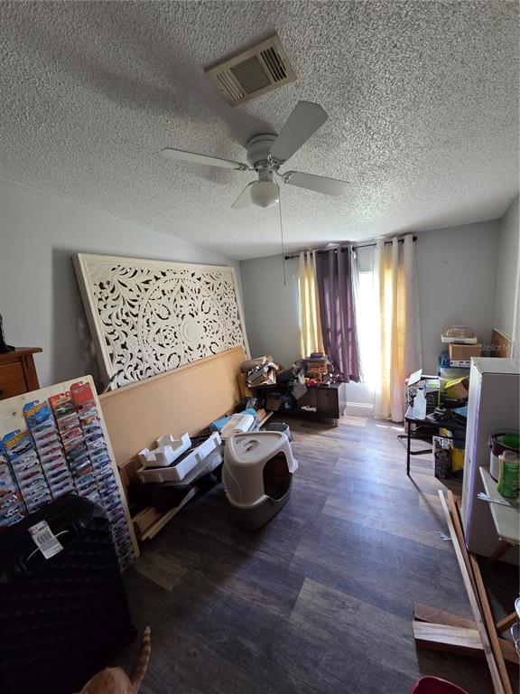 3935 Rambler Avenue St. Cloud, FL 34772 - Photo 24 of 36 a living room with furniture and wooden floor