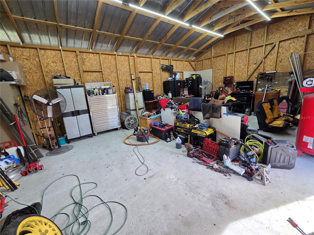 3935 Rambler Avenue St. Cloud, FL 34772 - Photo 33 of 36 a view of storage and utility room