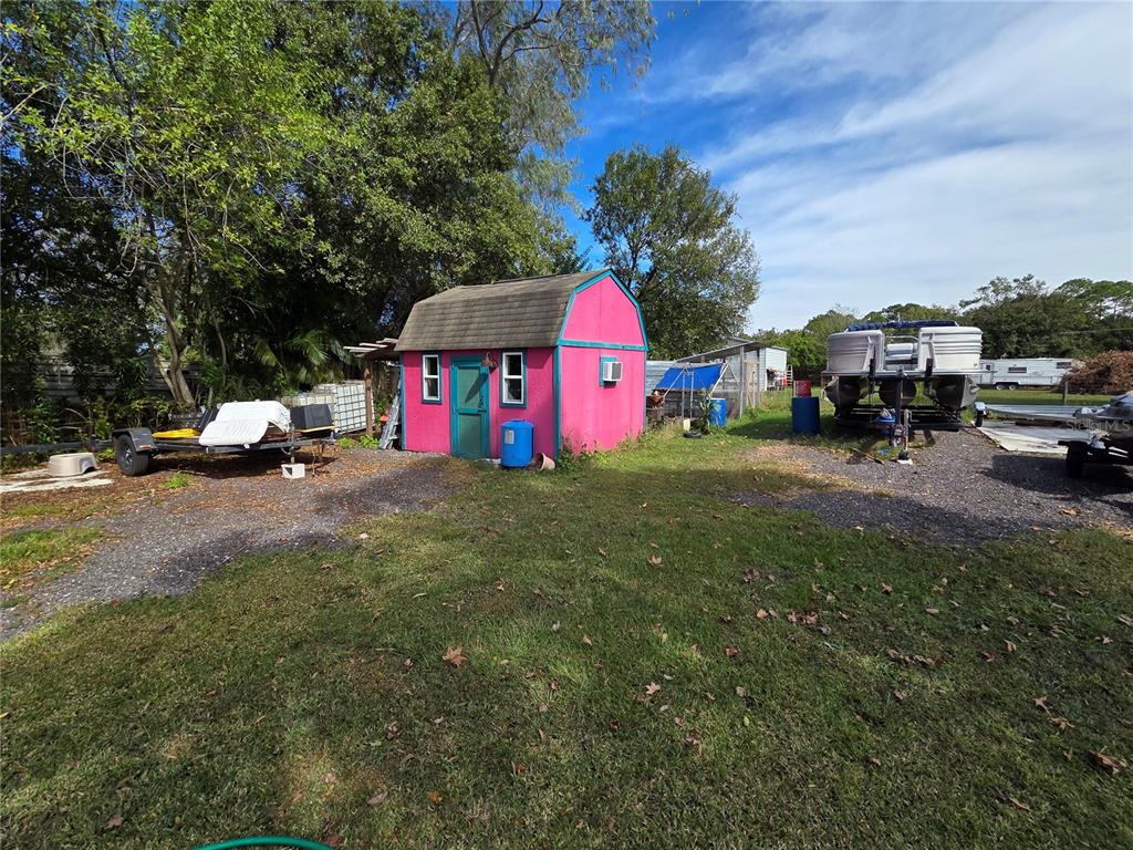 3935 Rambler Avenue St. Cloud, FL 34772 - Photo 36 of 36 a childrens park with lots of swings and slides