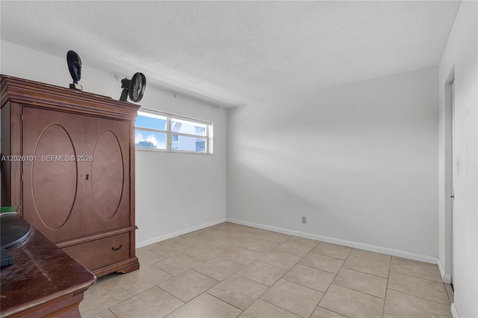 3551 Inverrary Drive, Unit 208 Lauderhill, FL 33319 - Photo 13 of 34 a view of a livingroom with washer and dryer