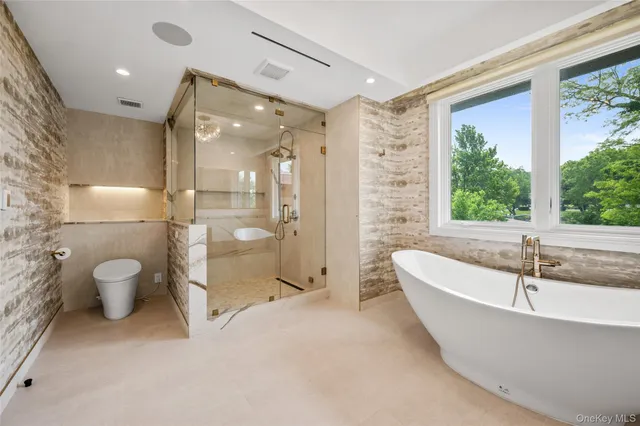 a bathroom with a sink and a large mirror