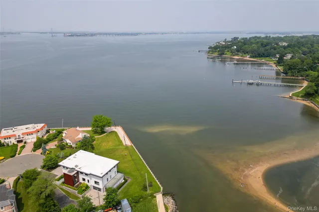 a view of a swimming pool and an outdoor seating