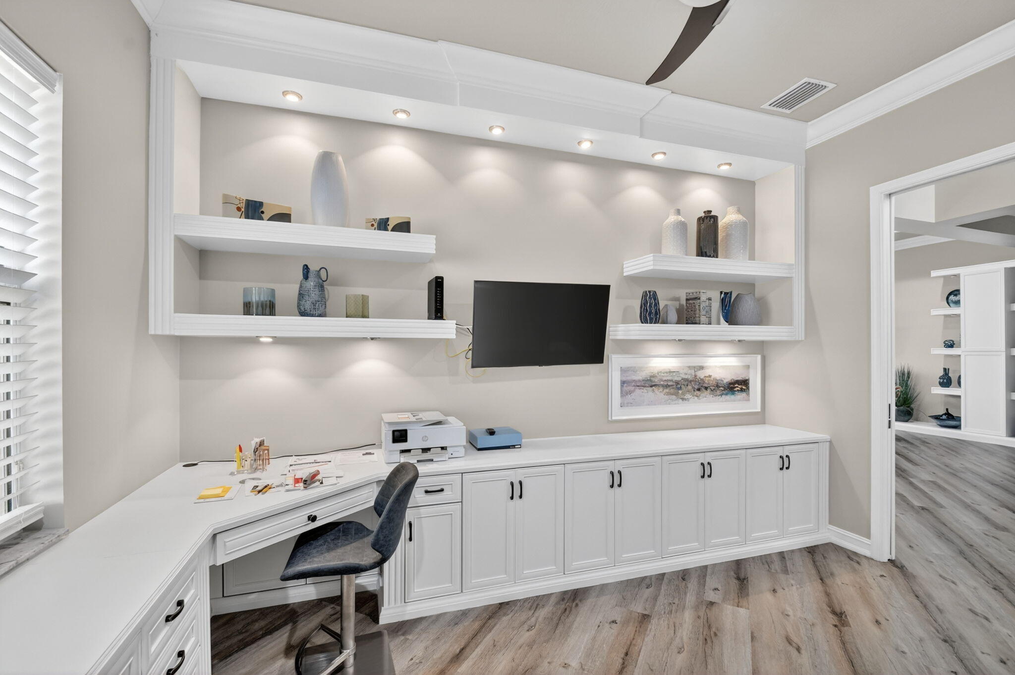 9119 Ribbons Ridge Point Boynton Beach, FL 33473 - Photo 11 of 91 a workspace with a wooden floor and furniture