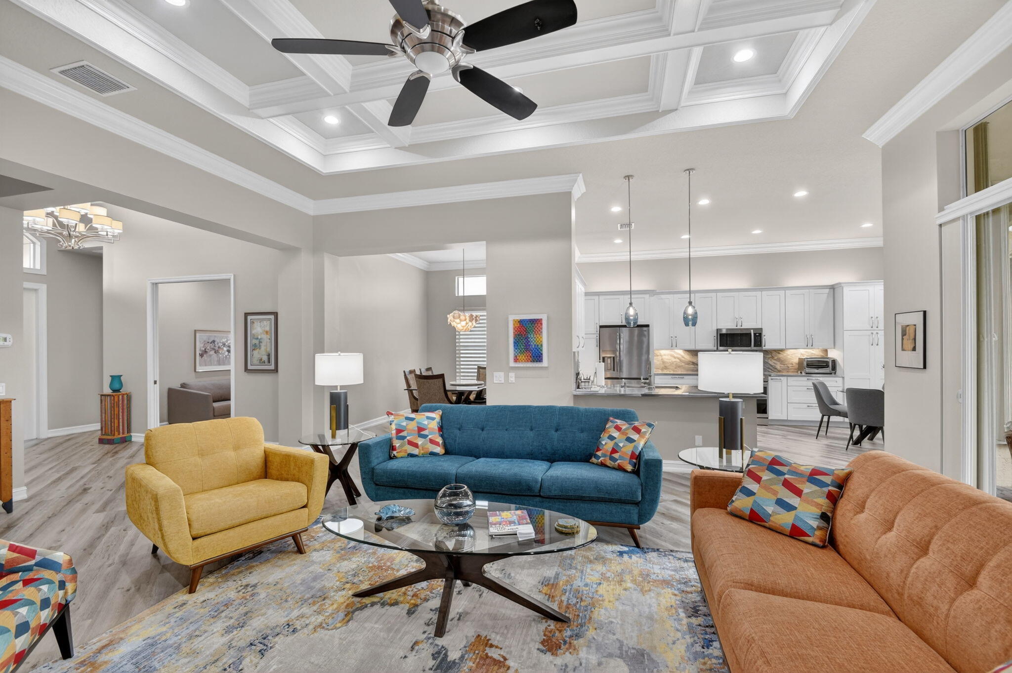 9119 Ribbons Ridge Point Boynton Beach, FL 33473 - Photo 15 of 91 a living room with furniture kitchen view and a chandelier
