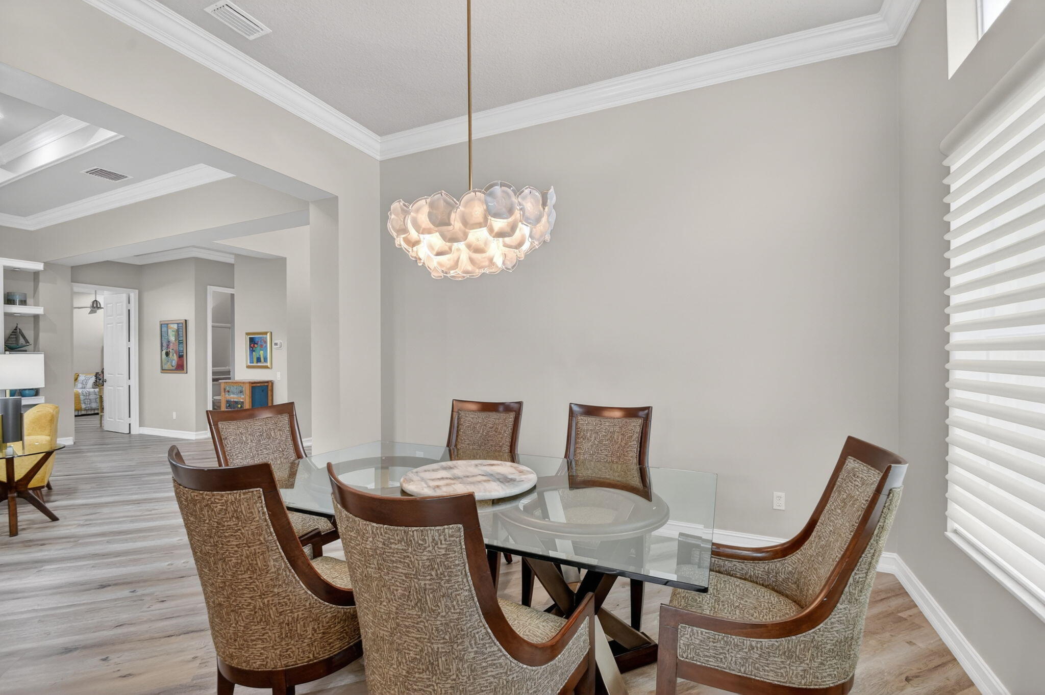 9119 Ribbons Ridge Point Boynton Beach, FL 33473 - Photo 19 of 91 a view of a dining room with furniture and wooden floor