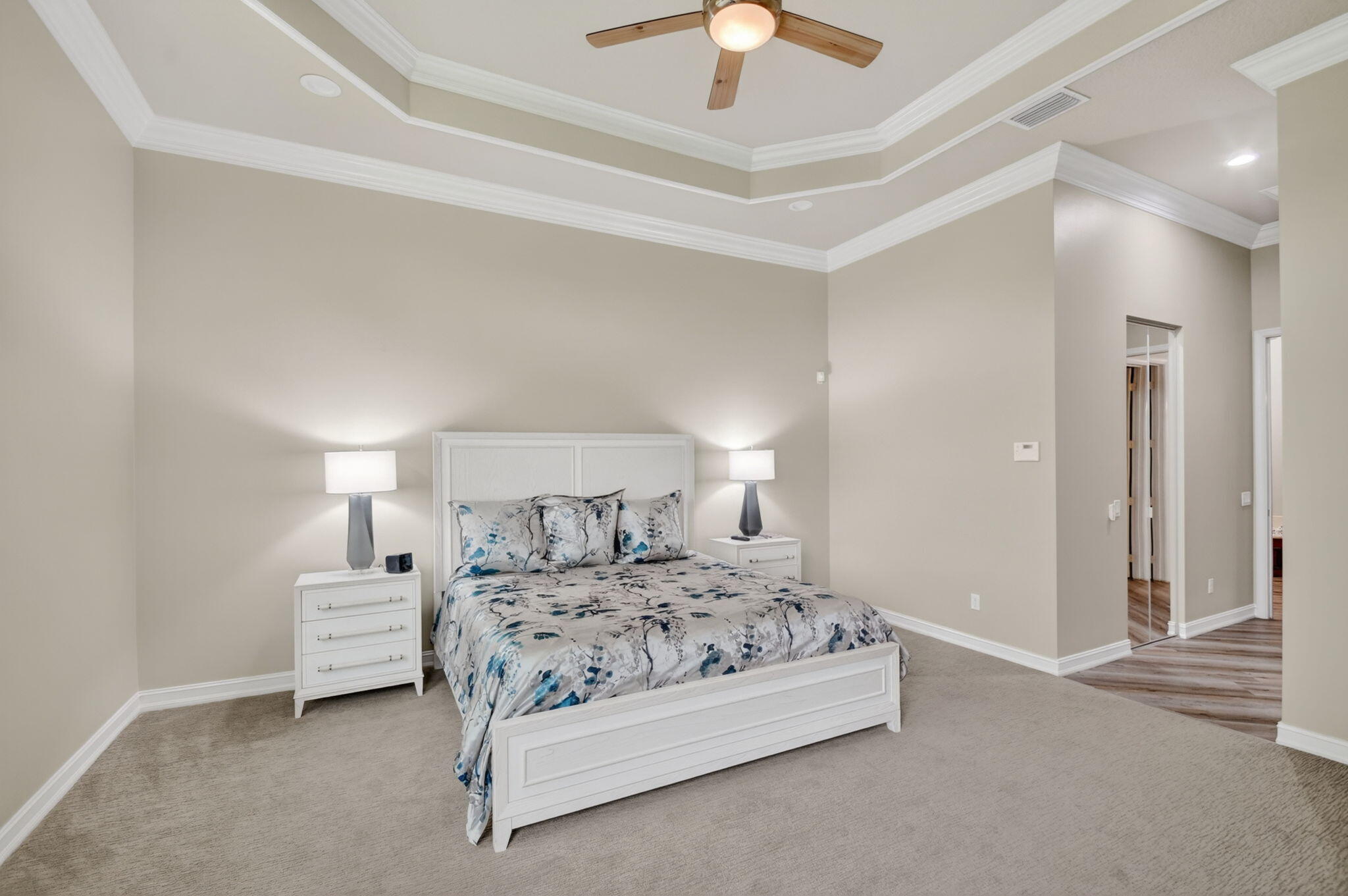 9119 Ribbons Ridge Point Boynton Beach, FL 33473 - Photo 21 of 91 a bedroom with a bed and a lamp