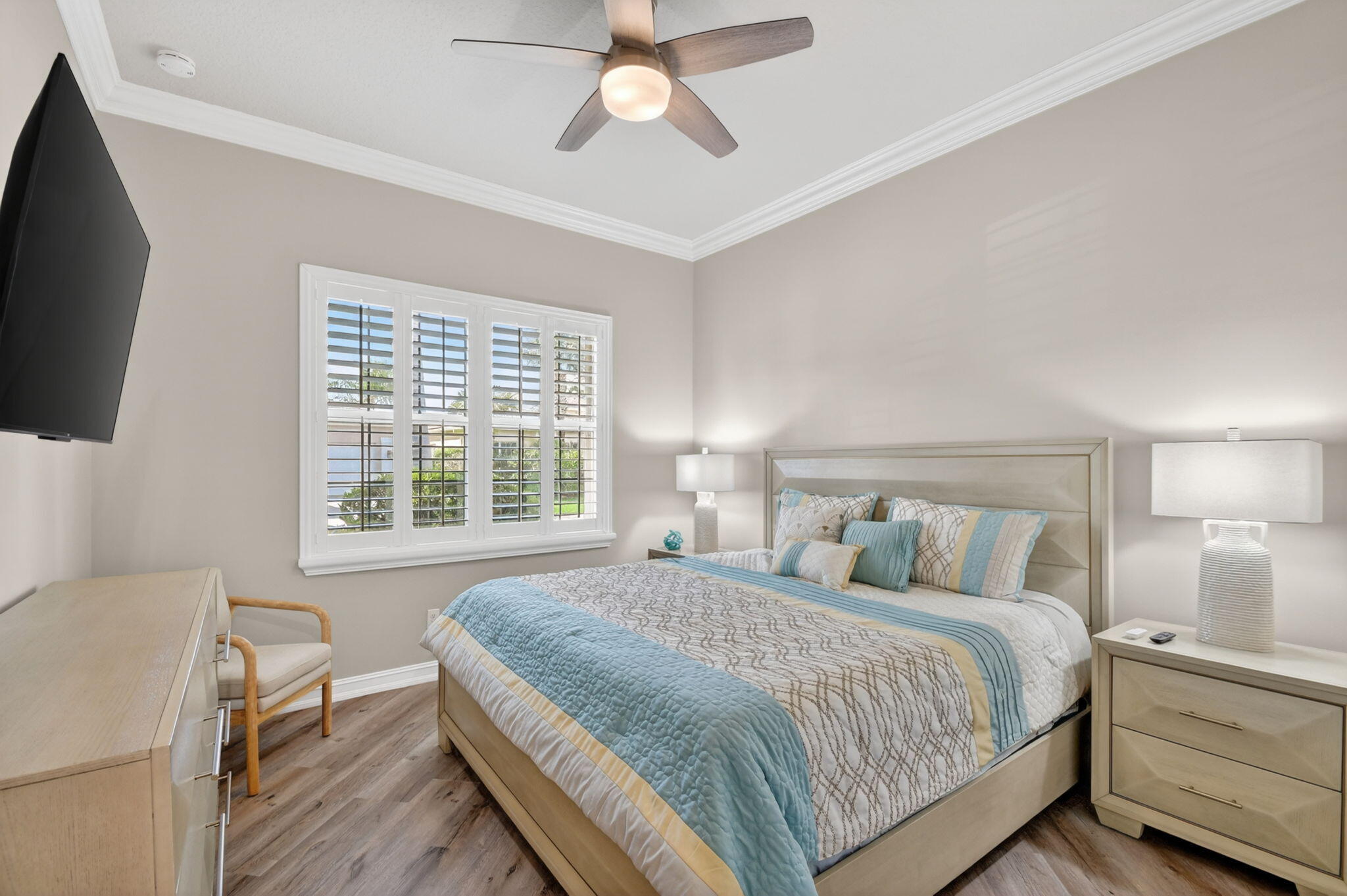 9119 Ribbons Ridge Point Boynton Beach, FL 33473 - Photo 29 of 91 a bedroom with a bed and a flat screen tv