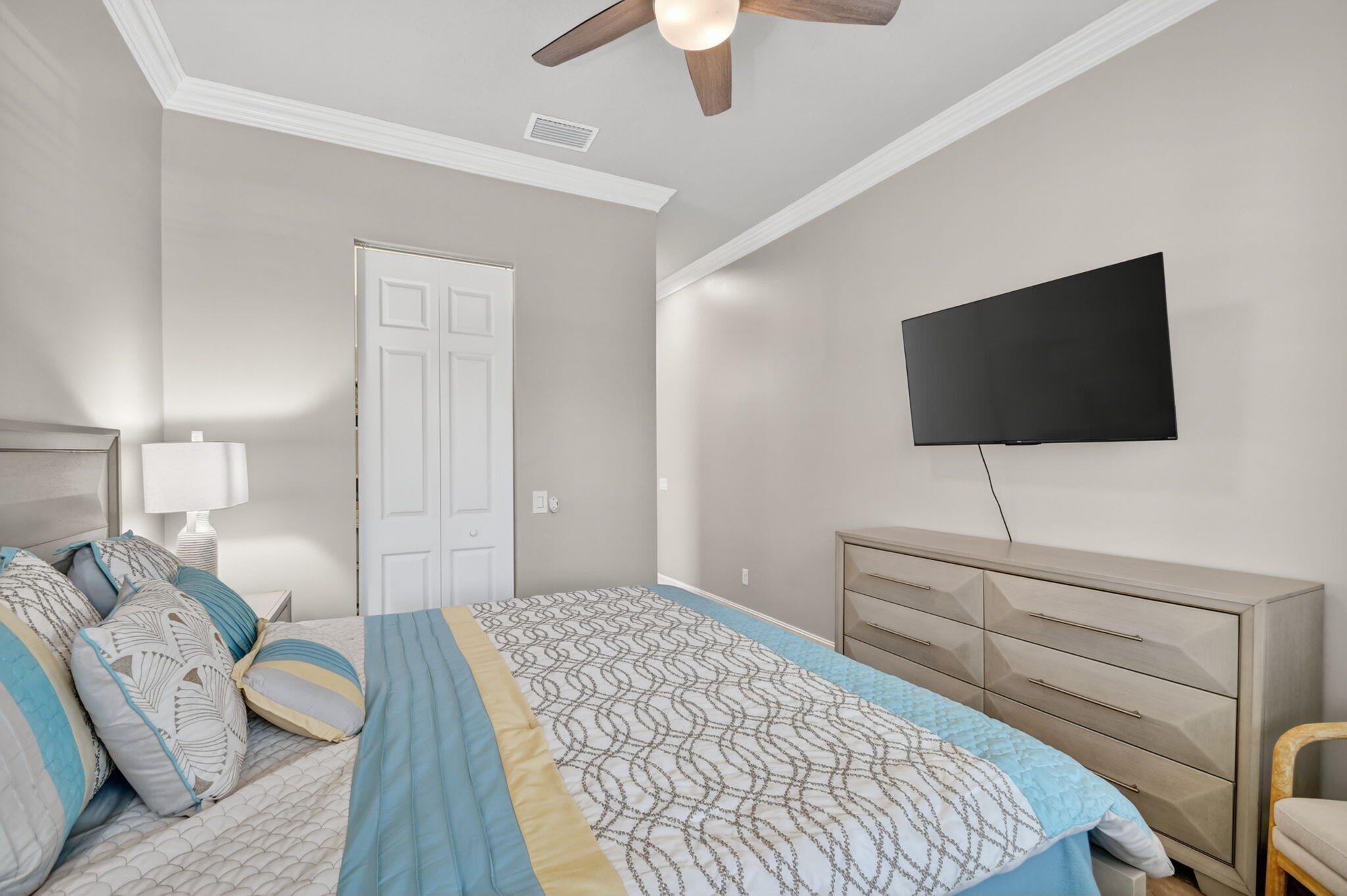 9119 Ribbons Ridge Point Boynton Beach, FL 33473 - Photo 30 of 91 a bedroom with a bed and a flat screen tv